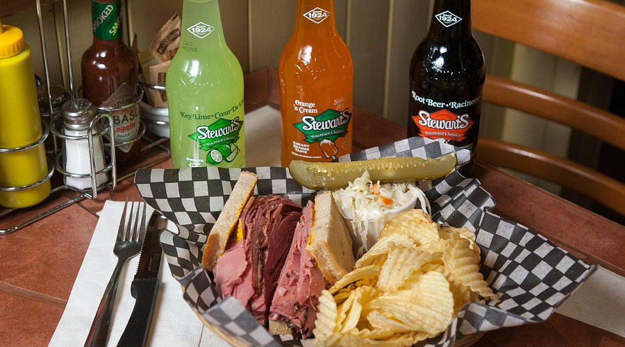 Phil Smoked Meat signature dishes Smoked Meat SandwichSmoked Meat PoutineClub SandwichHot Dog